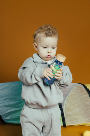 Petit Boum, sensory bottle, two-phase MOVE Spiral Blue